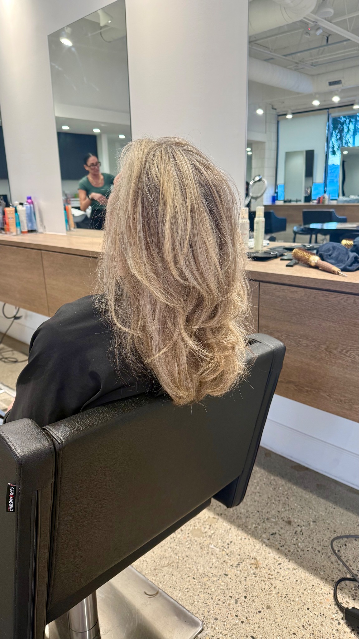 Dimensional blonde highlights with soft layers and movement